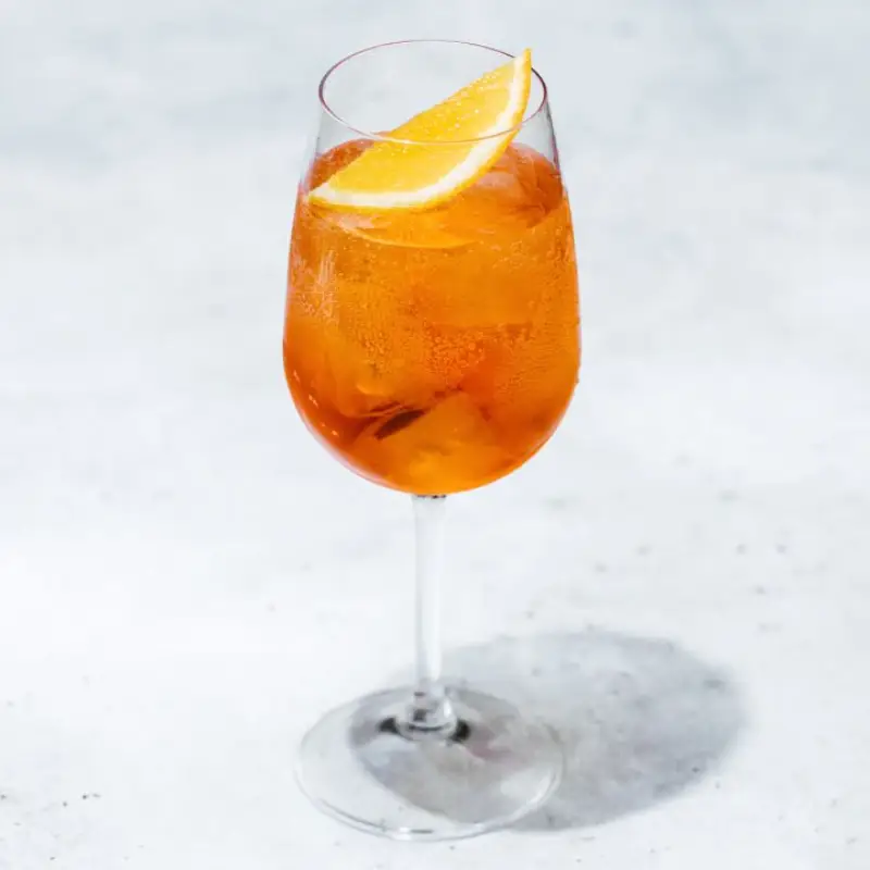 Aperol Spritz cocktail in a large wine glass